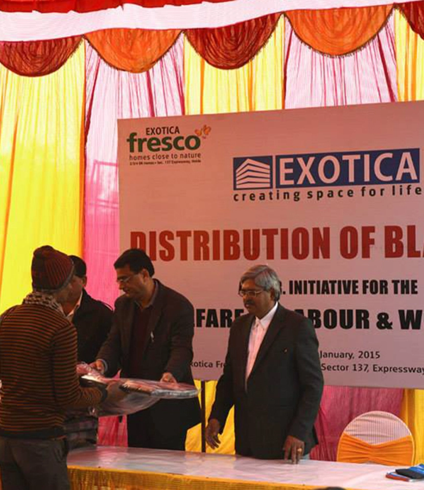 Blanket distribution drive by Exotica Housing for community support