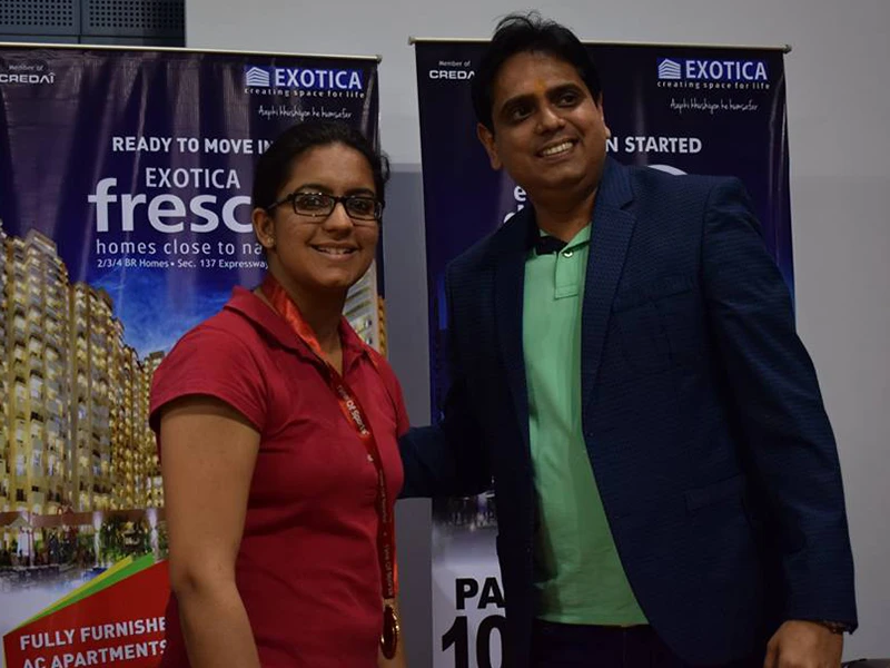 Exotica Housing event photo 1, celebration with residents and team, Noida